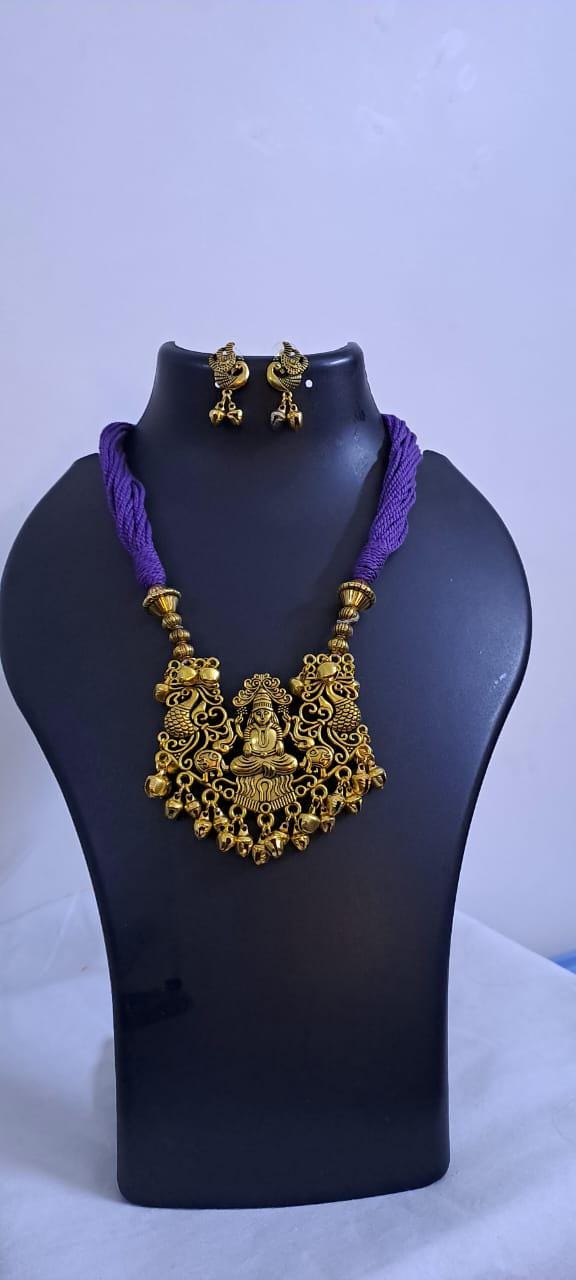 Purple thread necklace with Golden oxidised traditional pendant