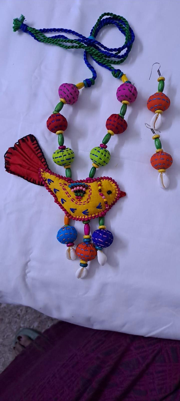 Exclusive fabric necklace with embroidered yellow fabric bird pendant and fabric beads n matching beads