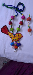 Exclusive fabric necklace with embroidered yellow fabric bird pendant and fabric beads n matching beads