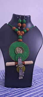 Exclusive green n brown thread beads necklace set with round thread n silver oxidised pendant n matching earrings