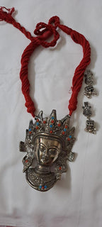 Maroon thread necklace with oxidised silver durga pendant