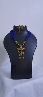 Blue thread necklace with Golden oxidised traditional pendant