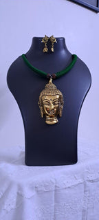 Green thread necklace with oxidised golden buddha pendant