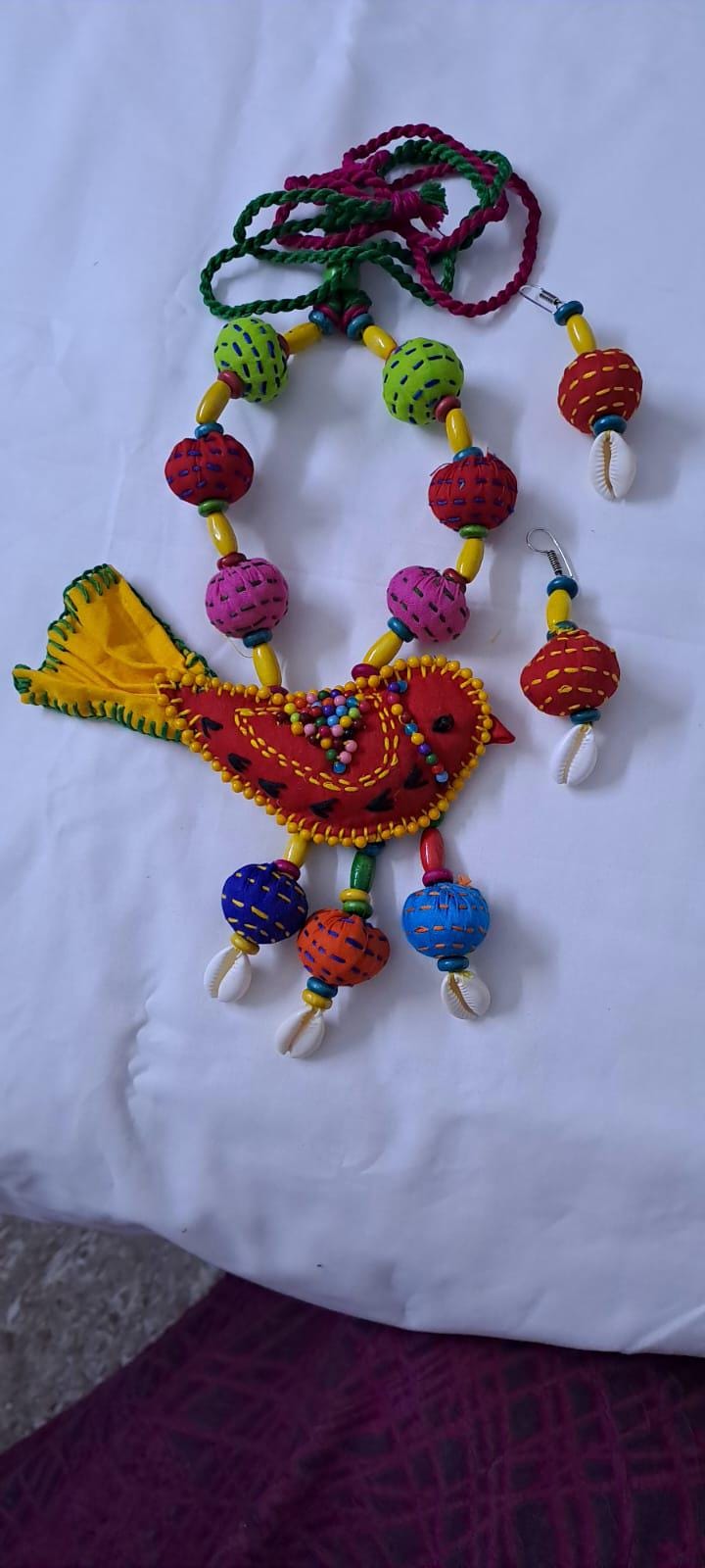 Exclusive fabric necklace with embroidered red fabric bird pendant and fabric beads n matching beads