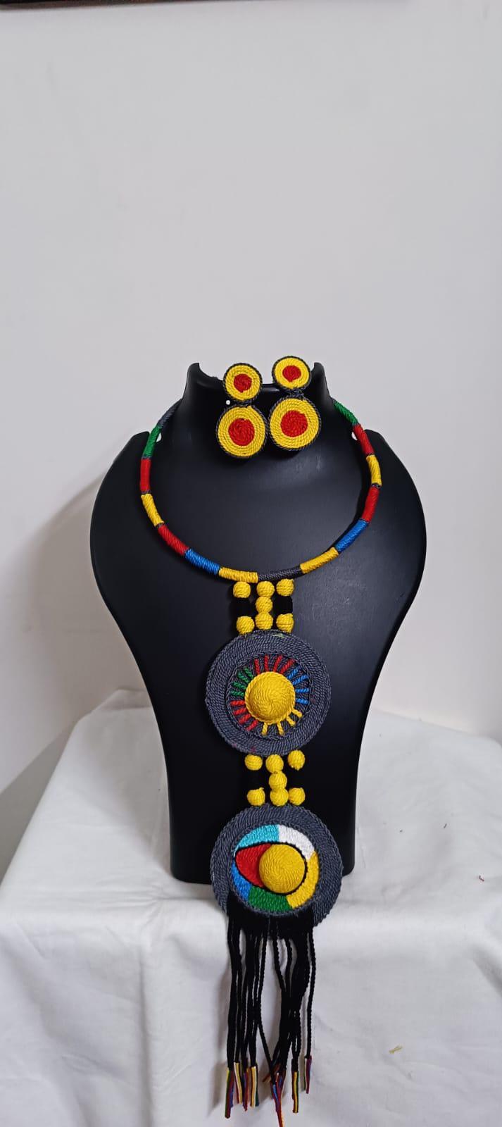 Exclusive multicoloured hasuli thread necklace set with round thread pendant n matching earrings