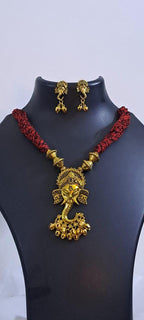 Red thread necklace with Golden oxidised traditional pendant