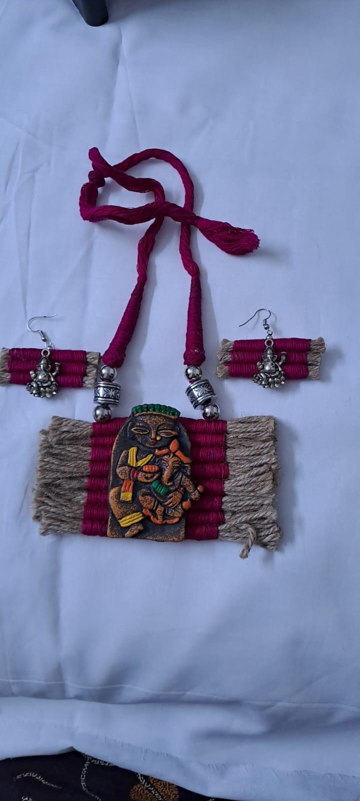 Terracotta Ganesha & Parvati pendant jute necklace set with matching earrings