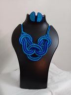 Celtic knot thread necklace with matching thread earrings.