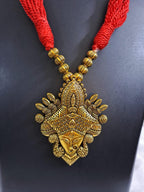 Red thread jewellery set with golden durga pendant n matching earrings