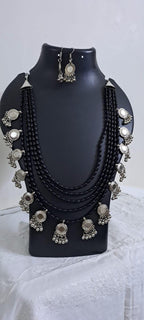 Exclusive multi layered  black glass beads necklace set with silver oxidised charms n matching earrings