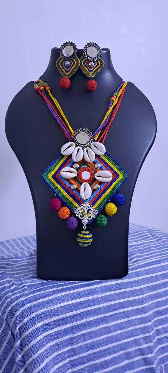Exclusive multicoloured thread necklace set with shell n thread pendant n matching earrings