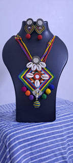 Exclusive multicoloured thread necklace set with shell n thread pendant n matching earrings