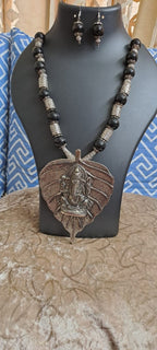 Black glass beads necklace with silver oxidised ganesha pendant