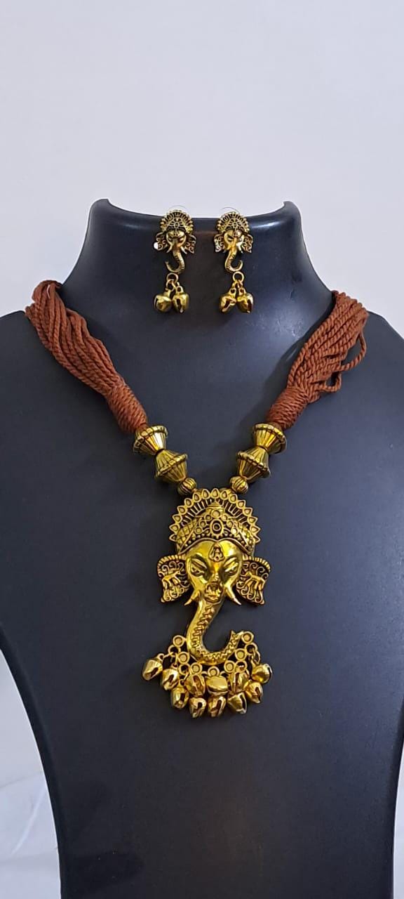 Brown thread necklace with Golden oxidised traditional pendant