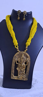 Yellow thread necklace with golden oxidised ganesha pendant
