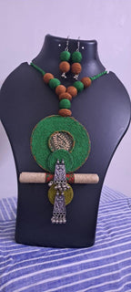 Exclusive green n brown thread beads necklace set with round thread n silver oxidised pendant n matching earrings