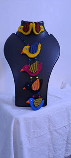 Multi coloured bird necklace and matching earrings