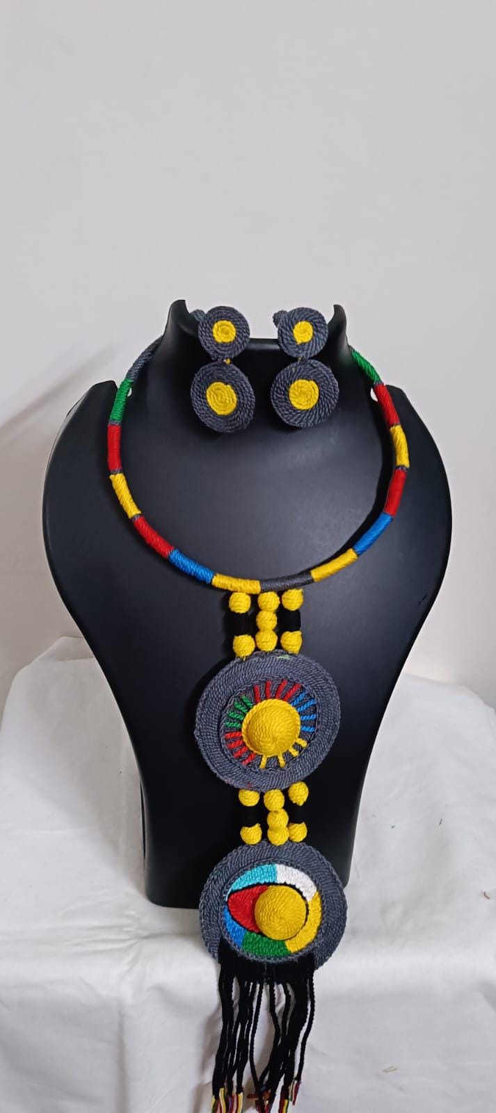 Exclusive multicoloured hasuli thread necklace set with round thread pendant n matching earrings