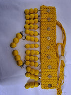 Yellow braided choker necklace set with fringes and matching earrings