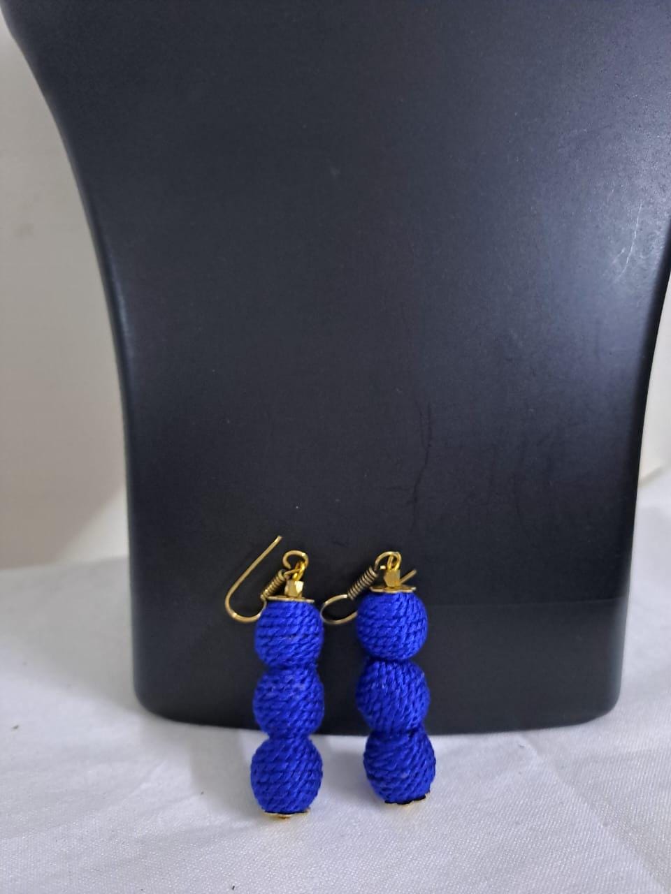 Blue braided choker necklace set with fringes and matching earrings