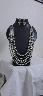 Multi layered glass pearl necklace set with matching earrings