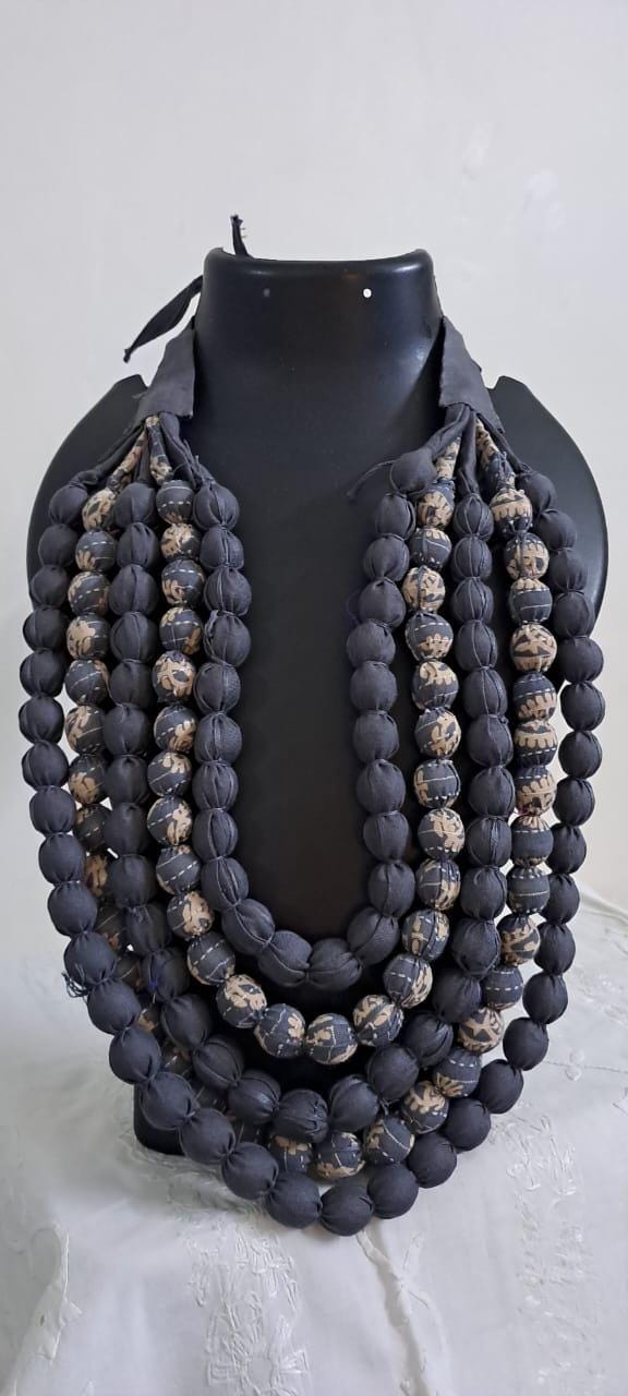 Exclusive multi-layered light grey fabric necklace