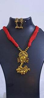 Red thread necklace with Golden oxidised traditional pendant
