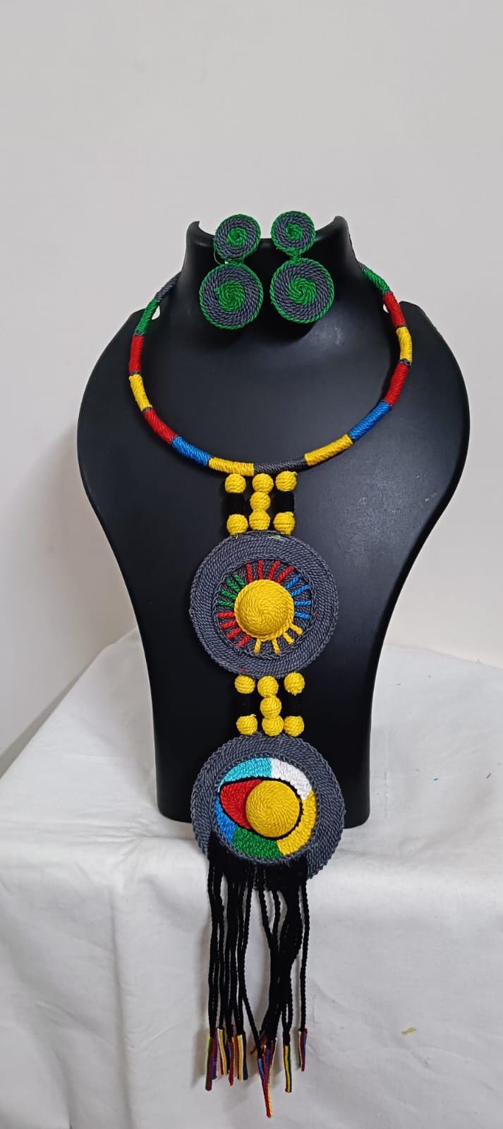 Exclusive multicoloured hasuli thread necklace set with round thread pendant n matching earrings