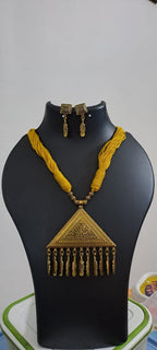 Yellow thread necklace with Golden oxidised traditional pendant