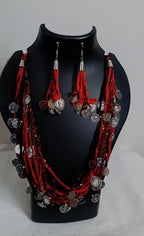 Exclusive multi-coloured and multi-layered thread necklace with silver oxidised charms