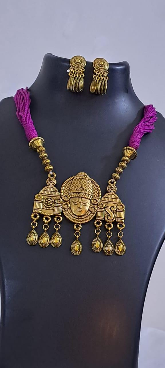 Pink thread necklace with Golden oxidised traditional pendant