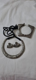 Exclusive silver oxidised hasuli set with matching earrings n bracelet