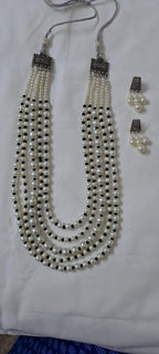 Multi layered glass pearl necklace set with matching earrings