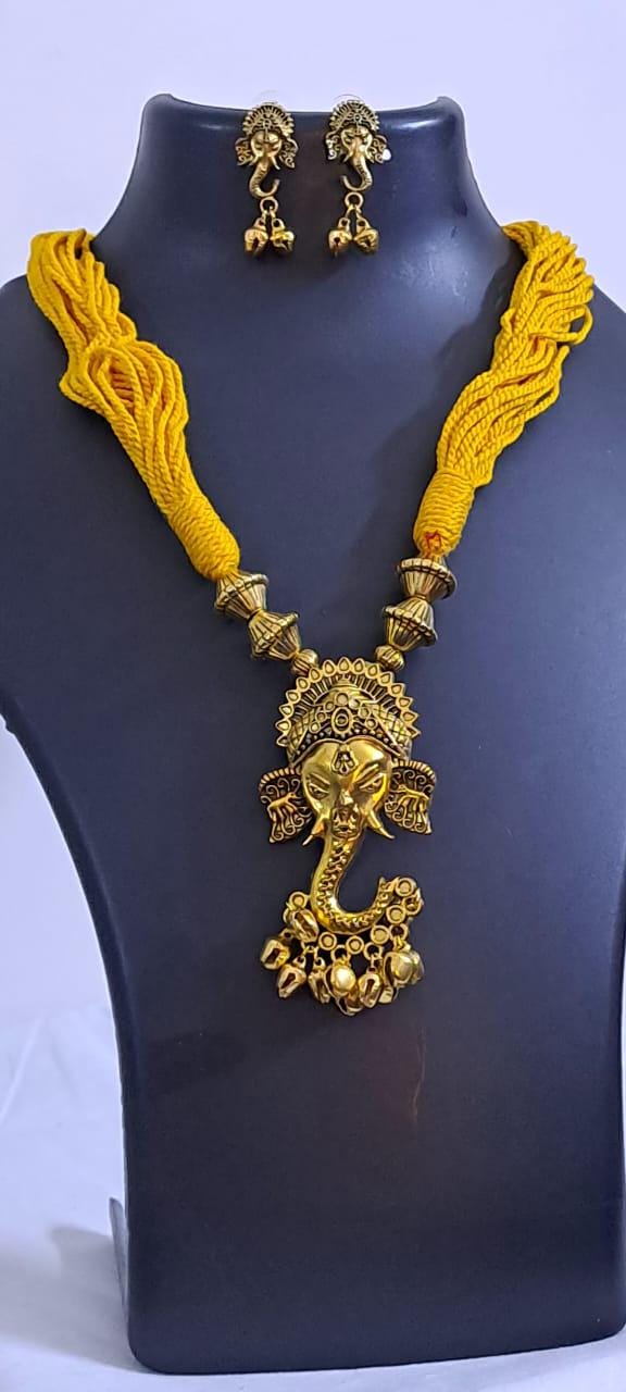 Yellow thread necklace with Golden oxidised traditional pendant