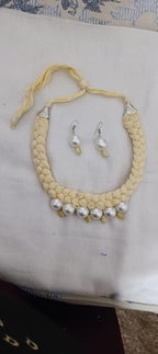 Offwhite braided thread necklace with pearl n pearl danglers