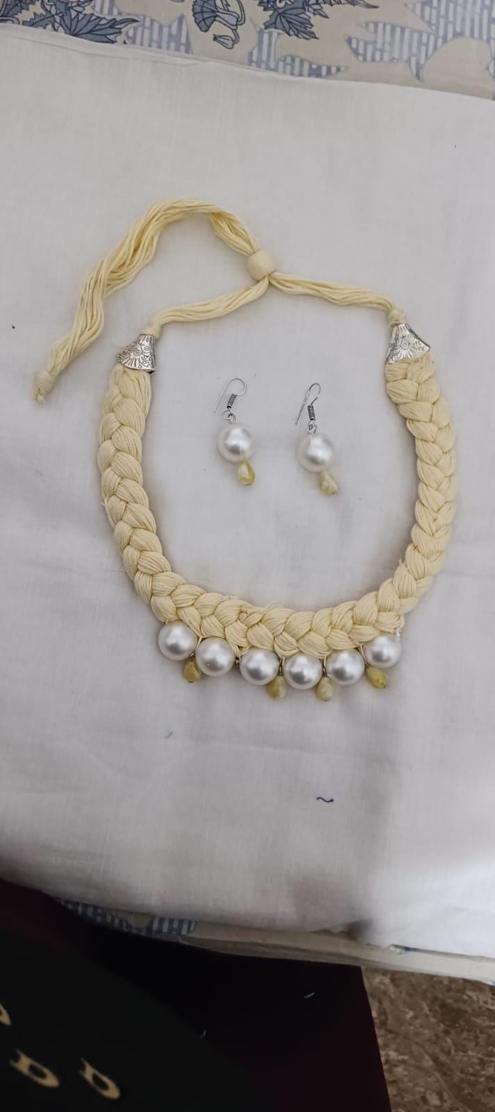 Offwhite braided thread necklace with pearl n pearl danglers