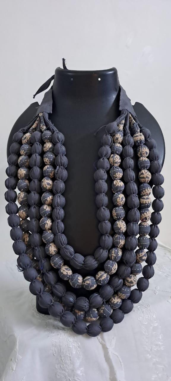 Exclusive multi-layered light grey fabric necklace