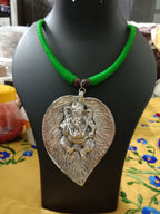 Green thread necklace with silver oxidised ganesha pendant