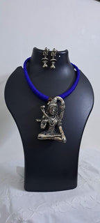 Blue thread necklace with silver oxidised lord shivji pendant