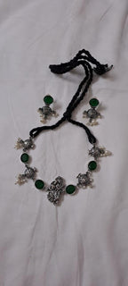 Exclusive silver oxidised lstone necklace with radha krishna pendant with matching earrings