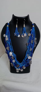 Exclusive multi-coloured and multi-layered thread necklace with silver oxidised charms