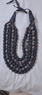Exclusive multi-layered light grey fabric necklace