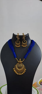 Blue thread necklace with Golden oxidised traditional pendant