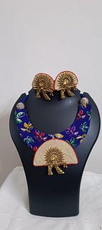 Unique fabric n thread necklace set with golden oxidised pendant and matching earrings