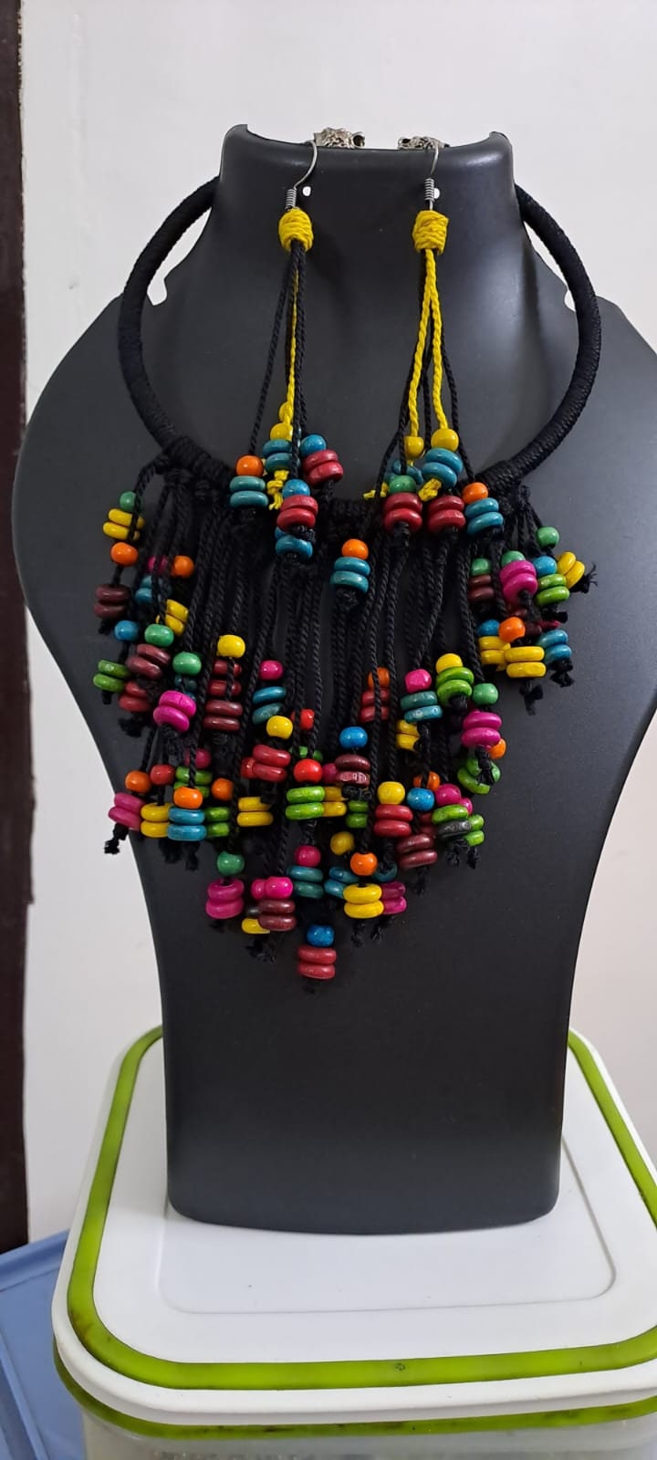 Exclusive black thread neckband with fringes and matching earrings.