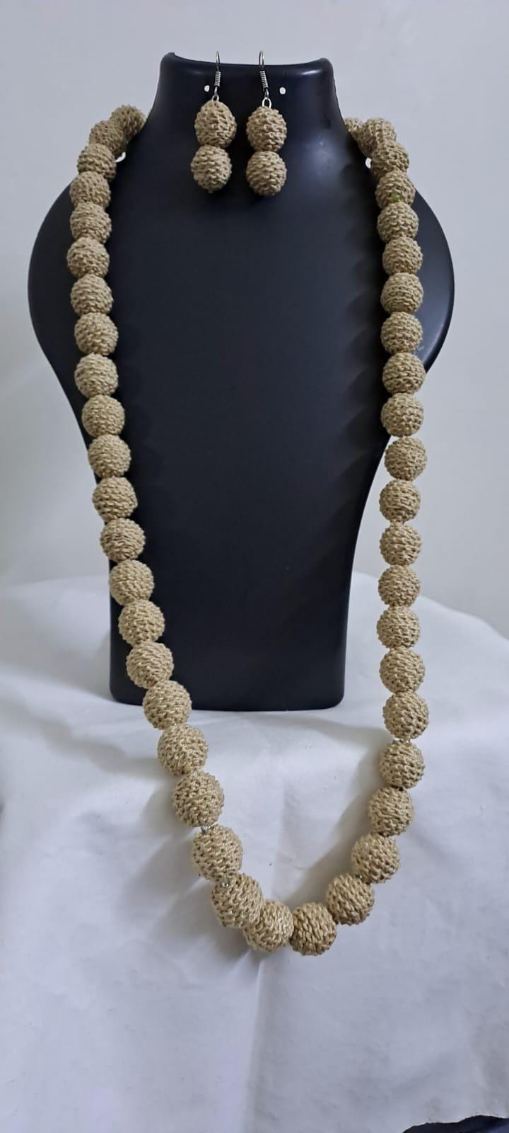 Exclusive beige colour thread beads long necklace set with matching earrings