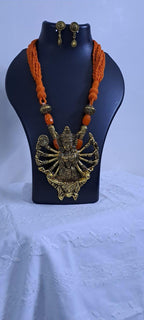 Orange thread necklace with oxidised golden durga pendant