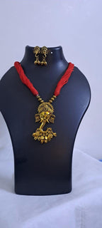 Red thread necklace with Golden oxidised traditional pendant