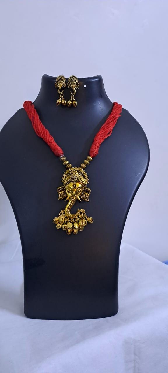 Red thread necklace with Golden oxidised traditional pendant