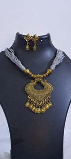 Grey thread necklace with Golden oxidised traditional pendant